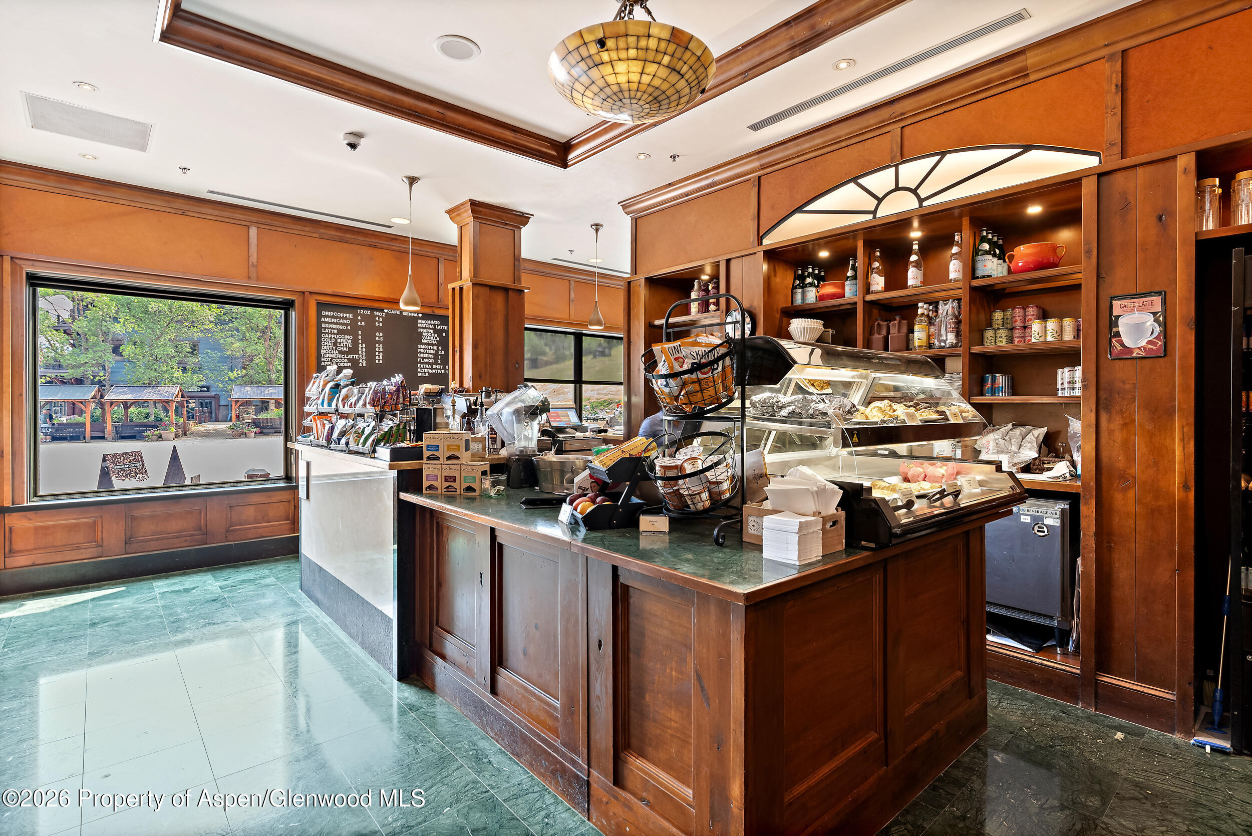 39 Boomerang Road, Unit 8210/WINTER INTEREST 3 Aspen, CO 81611 - Photo 37 of 44 a kitchen with stainless steel appliances granite countertop a stove and a refrigerator