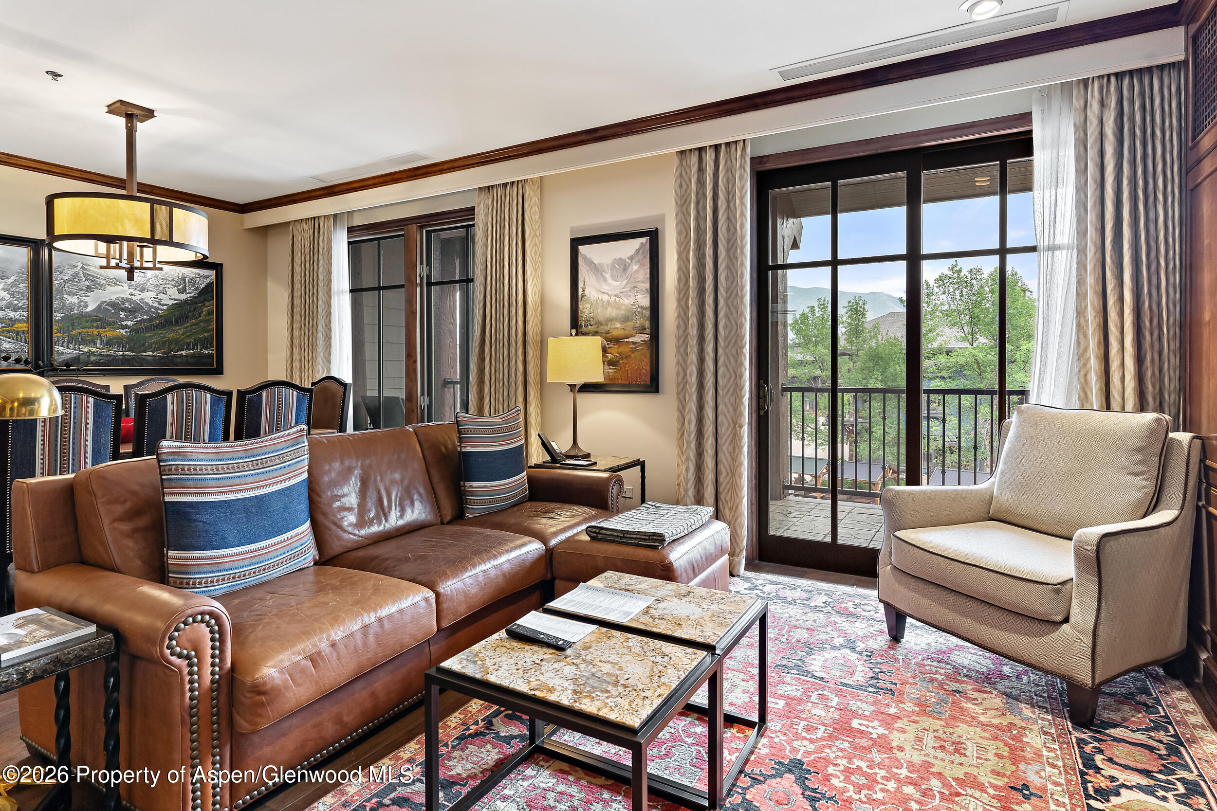 39 Boomerang Road, Unit 8210/WINTER INTEREST 3 Aspen, CO 81611 - Photo 4 of 44 a living room with furniture and a flat screen tv