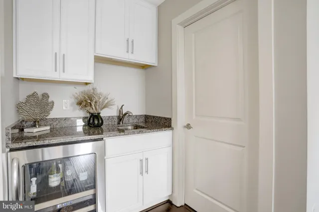 a front view of a house with patio