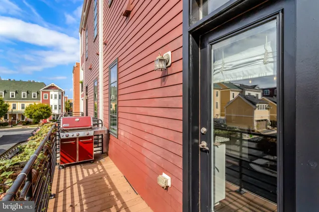a view of a balcony with a tree