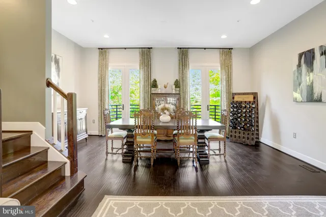 front view of a brick house with a small yard