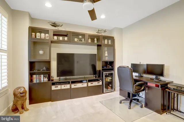 a view of a swimming pool with an outdoor seating