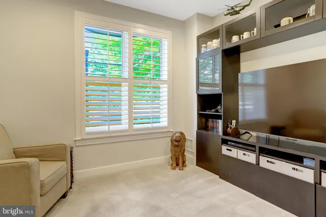 a view of a lake with houses in the back