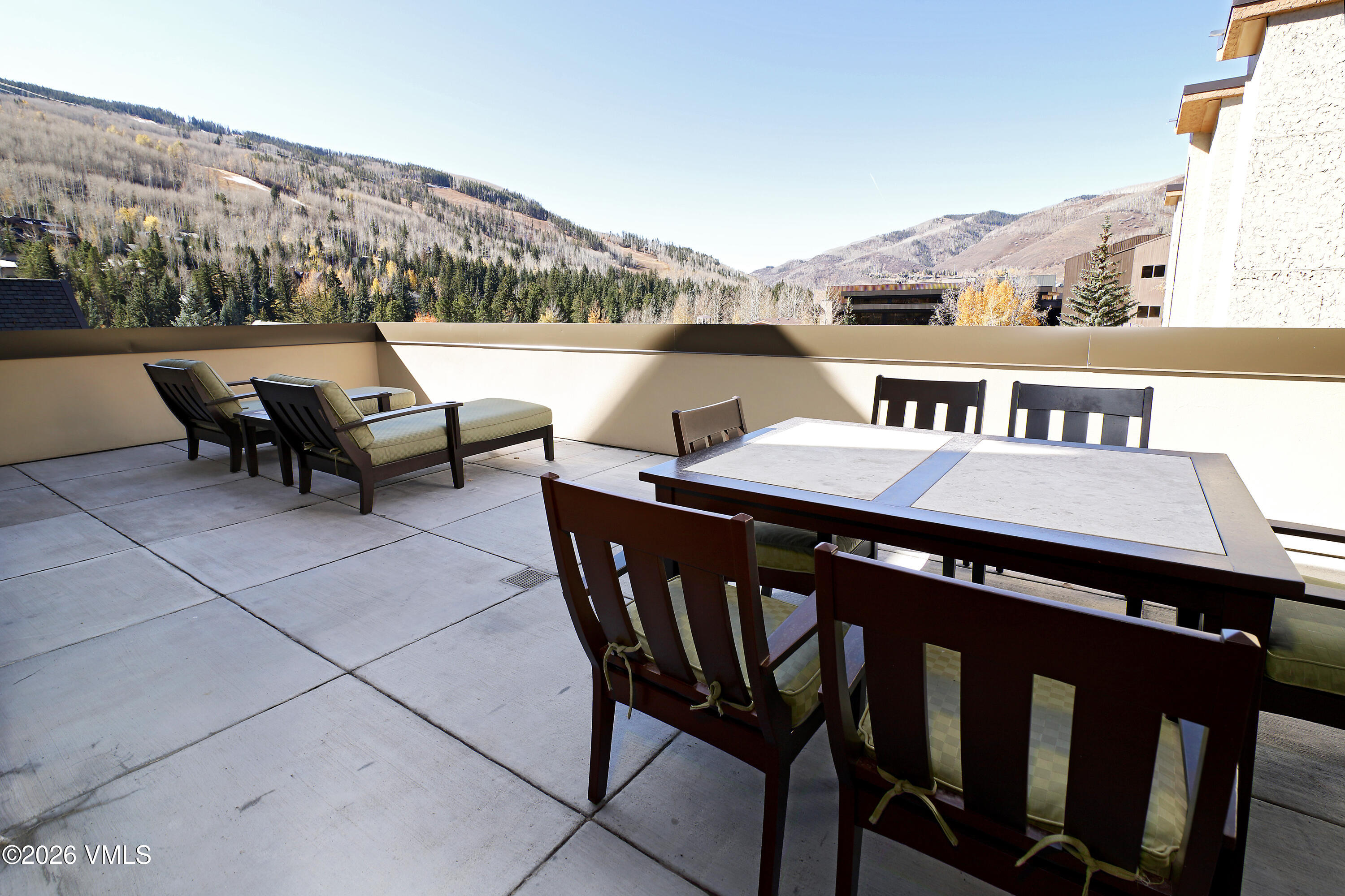 1 Vail Road, Unit 7105F Vail, CO 81657 - Photo 25 of 25 a terrace of a house with outdoor seating