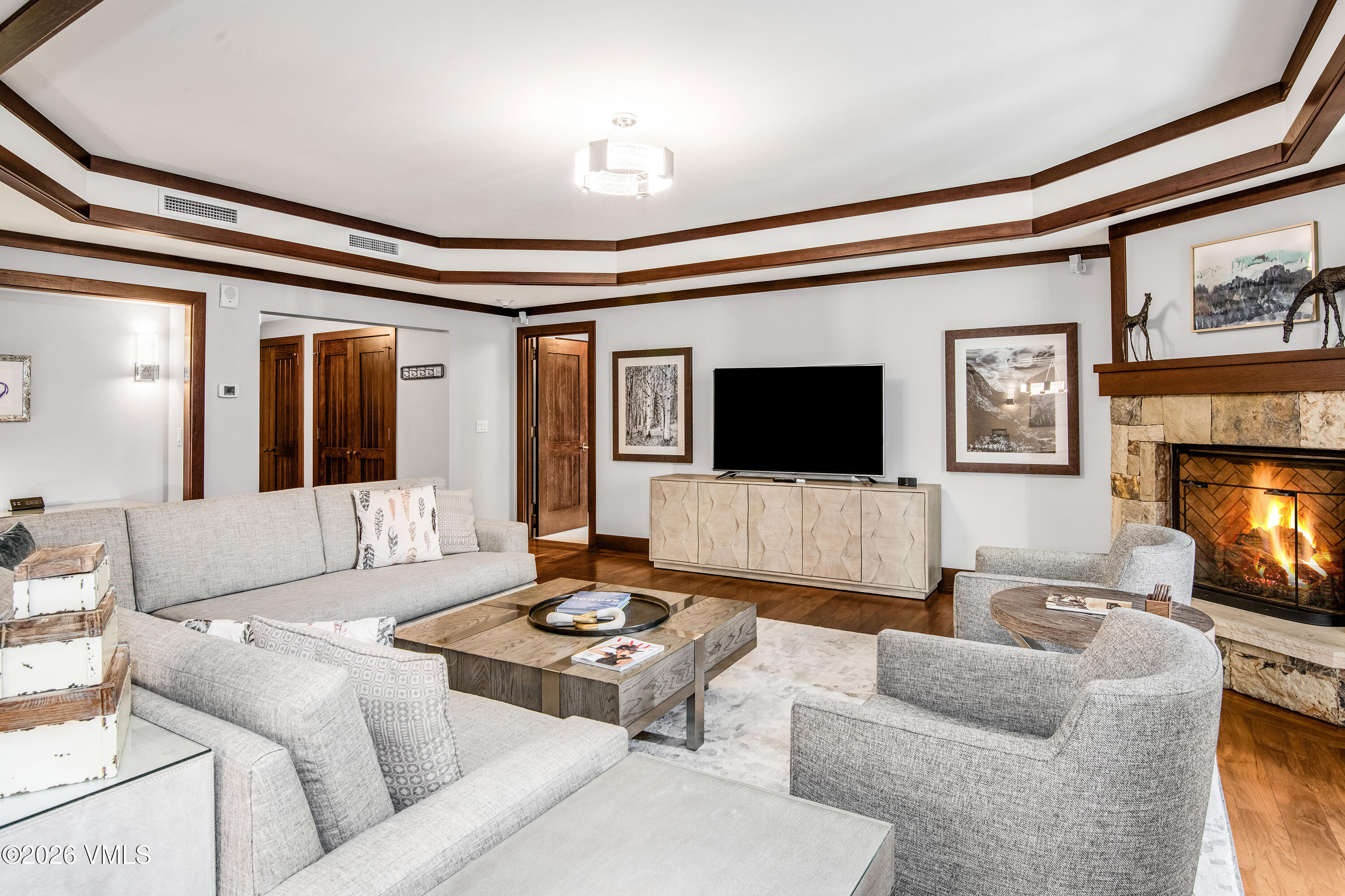 1 Vail Road, Unit 7105F Vail, CO 81657 - Photo 5 of 25 a living room with furniture and a flat screen tv