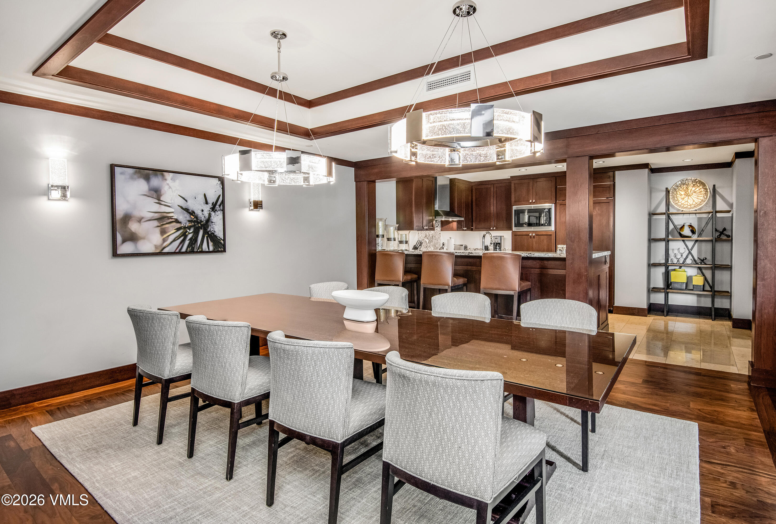 1 Vail Road, Unit 7105F Vail, CO 81657 - Photo 8 of 25 a dining room with furniture a chandelier and window