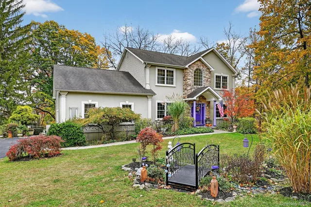 a front view of house with garden