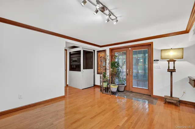 a view of livingroom with furniture and floor to ceiling window