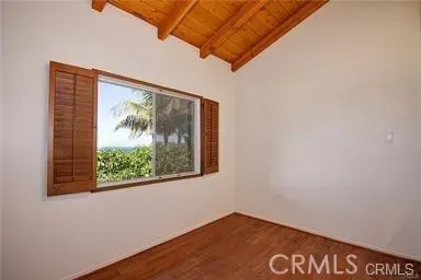 a view of a wall with a window