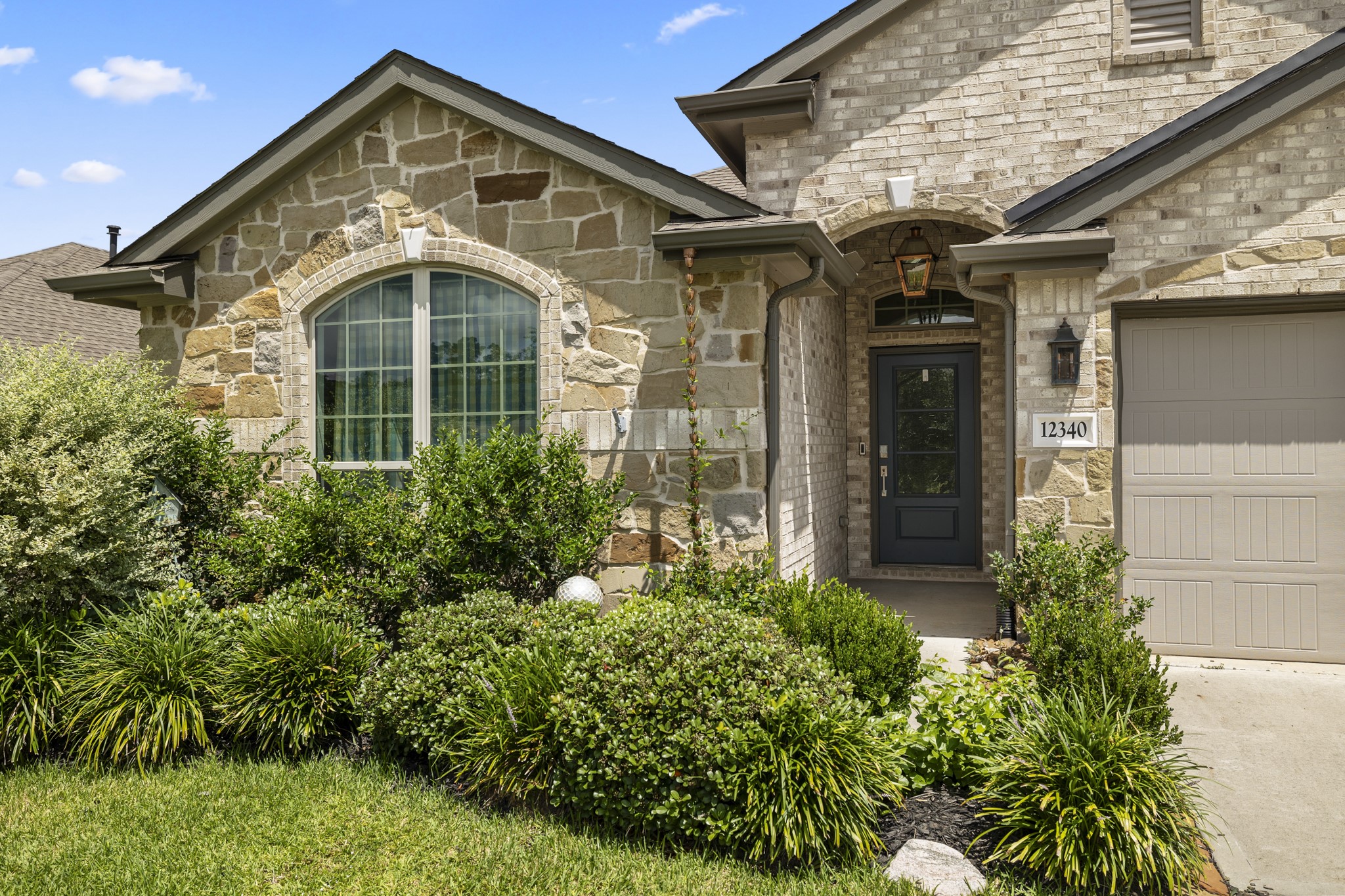 12340 Delta Timber Road Conroe, TX 77304 - Photo 3 of 41 Inviting landscaping.