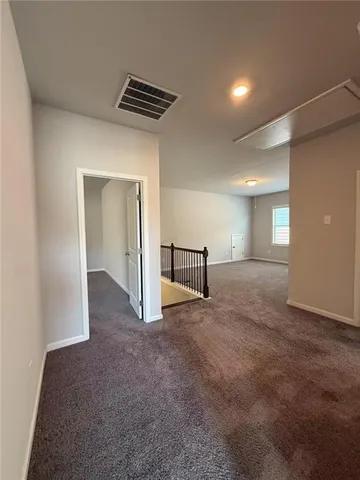 a view of a livingroom with a staircase