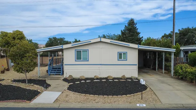 a front view of house with yard