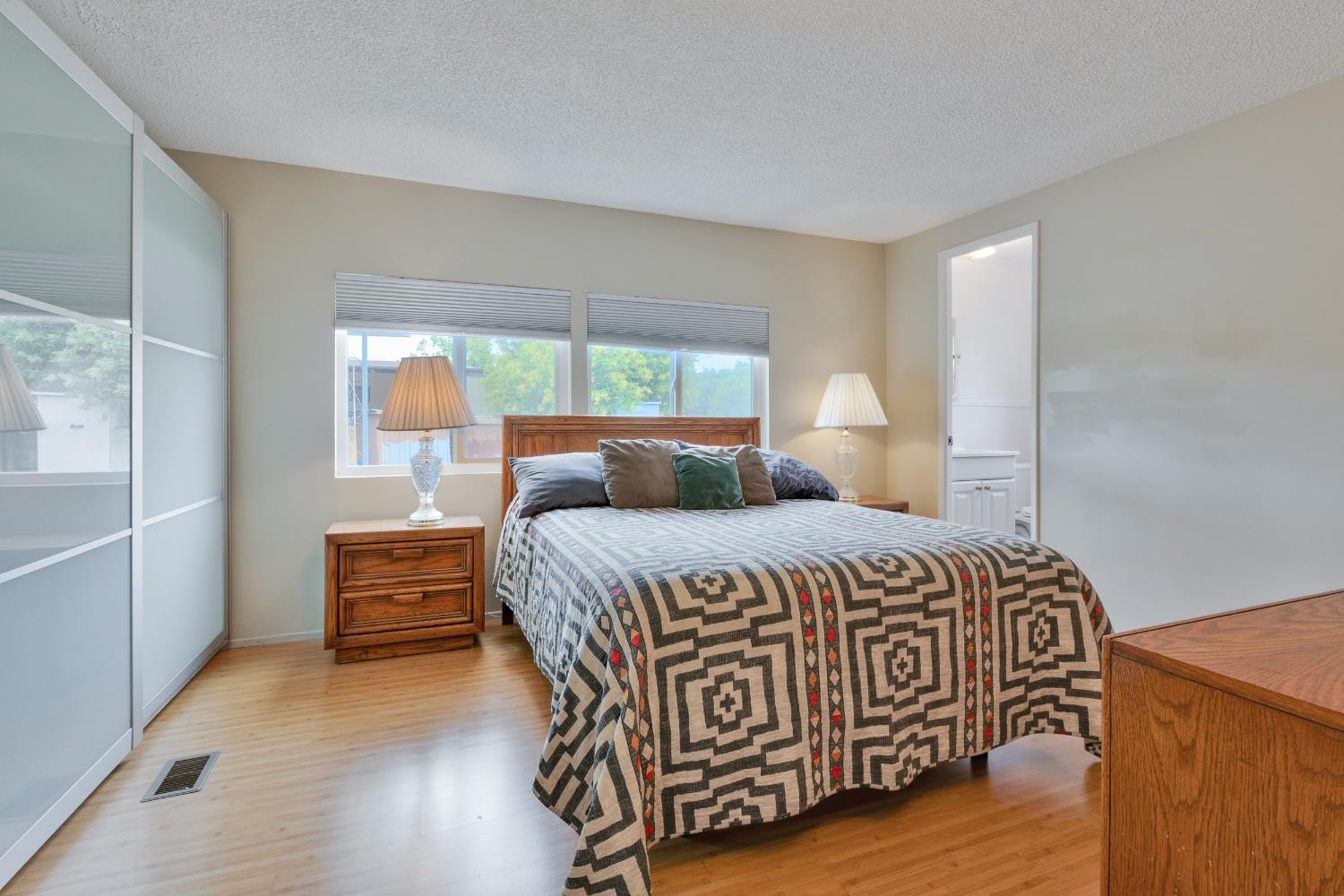 472 Oleander View Way Rancho Cordova, CA 95670 - Photo 14 of 21 a bedroom with a bed and wooden floor