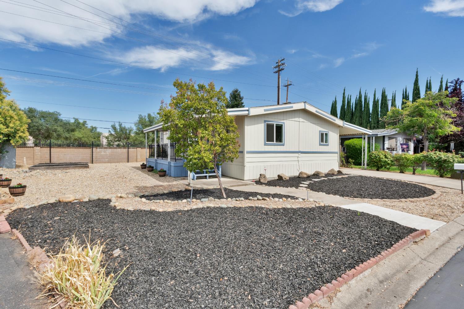 472 Oleander View Way Rancho Cordova, CA 95670 - Photo 2 of 21 a front view of a house with a yard