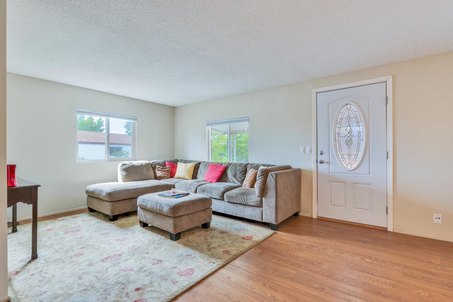 472 Oleander View Way Rancho Cordova, CA 95670 - Photo 6 of 21 a living room with furniture and a window