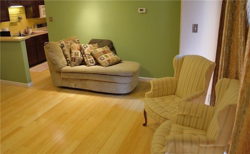 3115 Helms Street, Unit 304 Austin, TX 78705 - Photo 7 of 13 a living room with furniture
