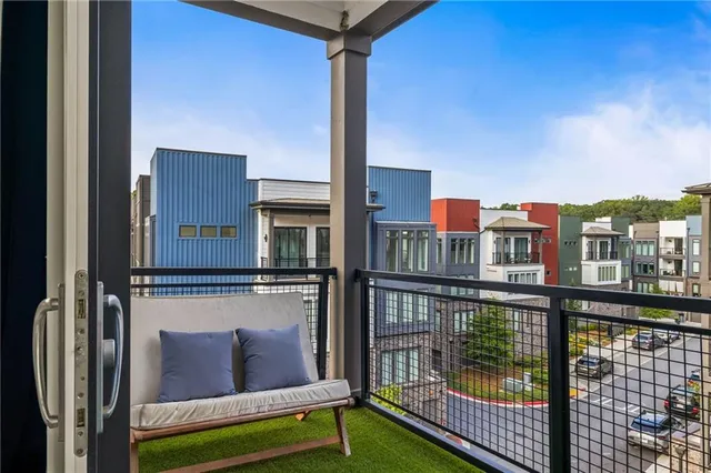a view of a backyard with a garden and deck