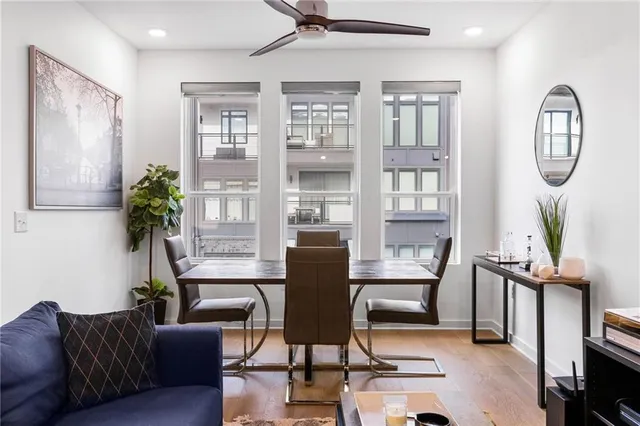 a view of a livingroom with furniture and a potted plant