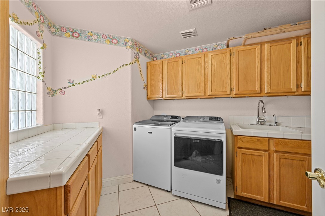 736 Kiel Street Henderson, NV 89015 - Photo 25 of 38 Laundry Room off Kitchen