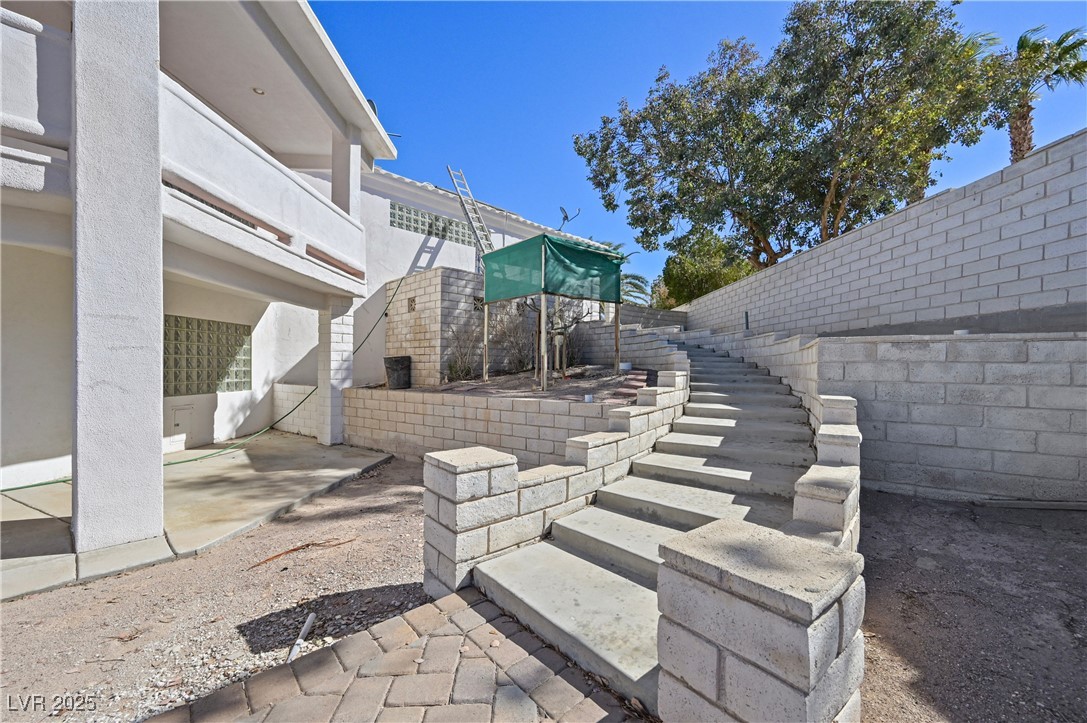 736 Kiel Street Henderson, NV 89015 - Photo 33 of 38 View of patio / terrace with a fenced backyard and stairway