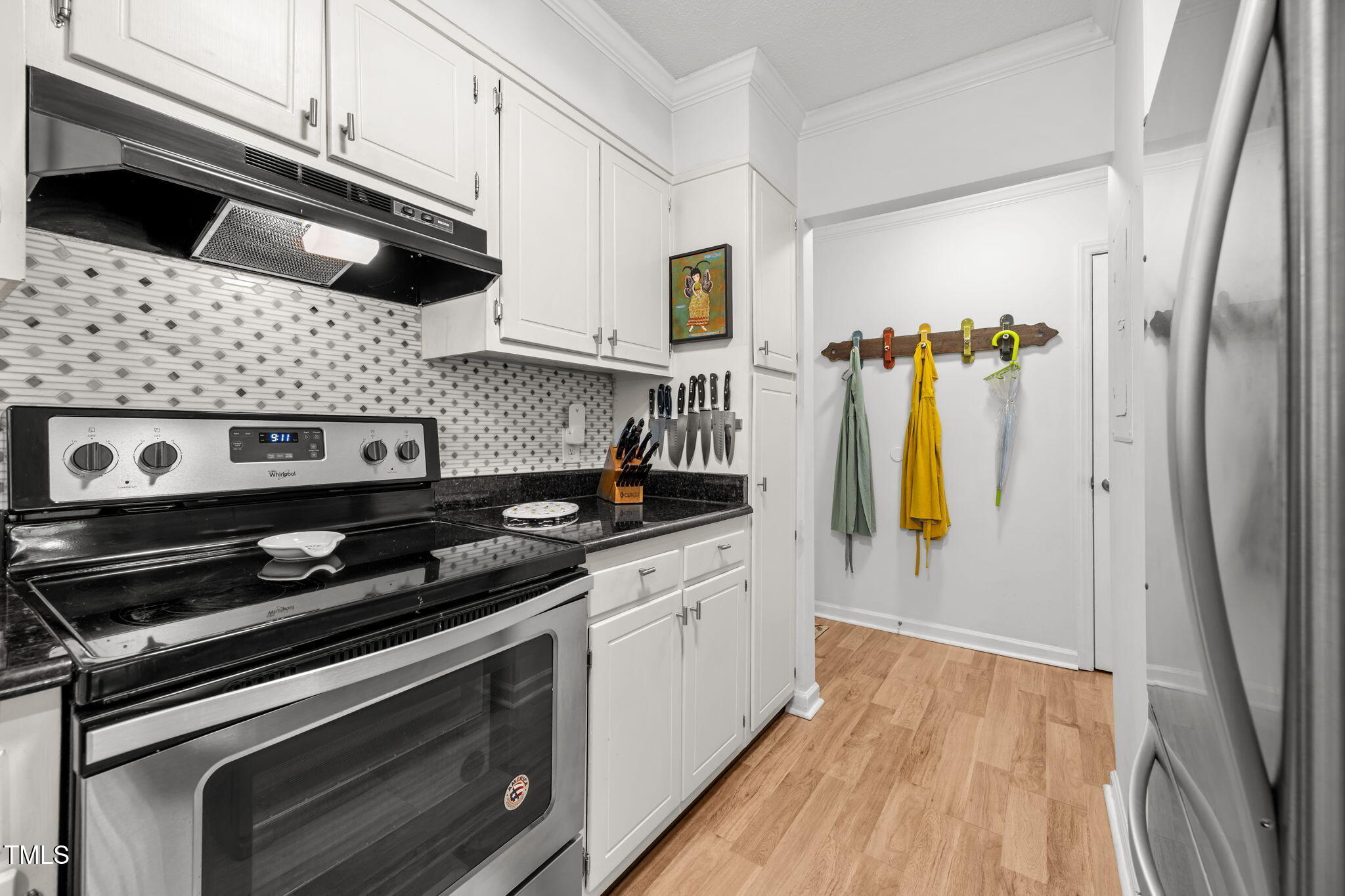 5024 Flint Ridge Place Raleigh, NC 27609 - Photo 8 of 46 A functional and stylish kitchen gives tons of prep room and a stylish workspace