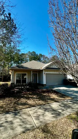 a front view of a house with a patio