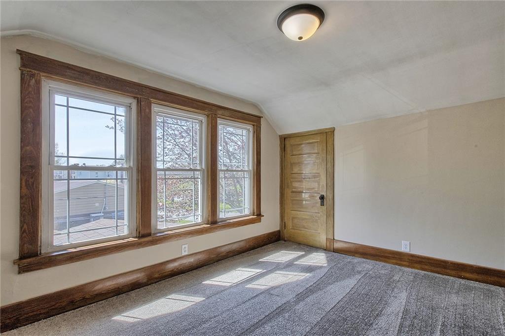 109 Lycippus Hardware Road Latrobe, PA 15650 - Photo 14 of 18 a view of an empty room with a window and wooden floor