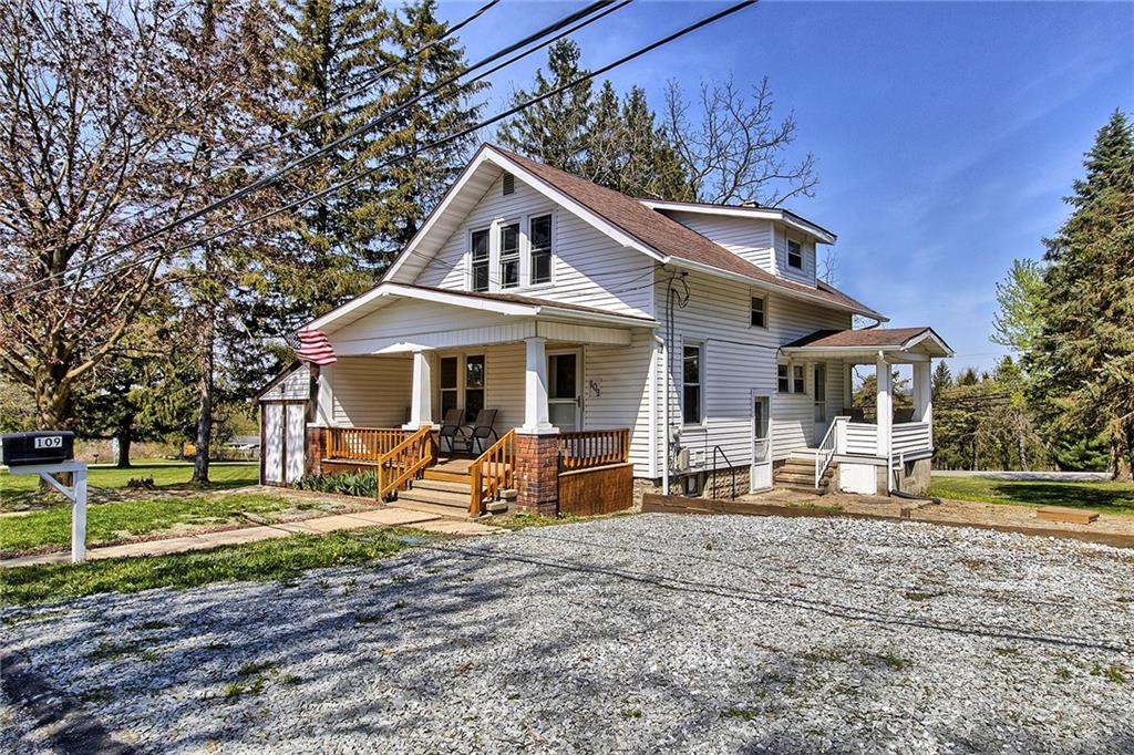109 Lycippus Hardware Road Latrobe, PA 15650 - Photo 2 of 18 a front view of a house with garden and trees