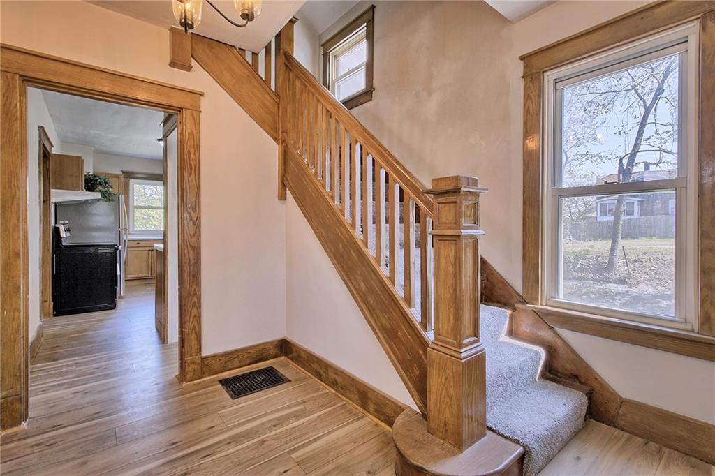 109 Lycippus Hardware Road Latrobe, PA 15650 - Photo 8 of 18 a view of staircase with wooden floor and a large window