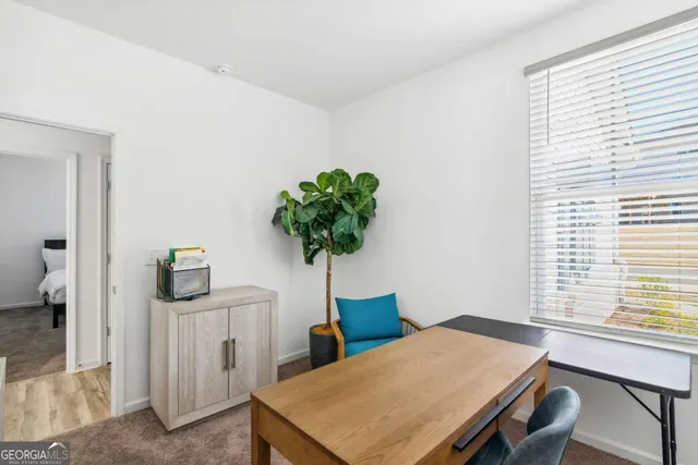 a room with furniture and a window