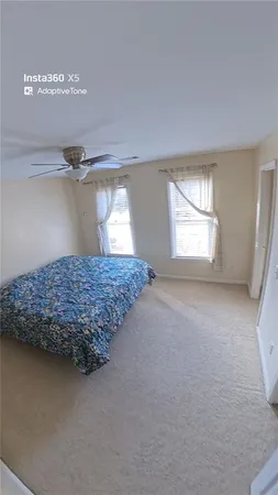 a bathroom with a tub and a sink