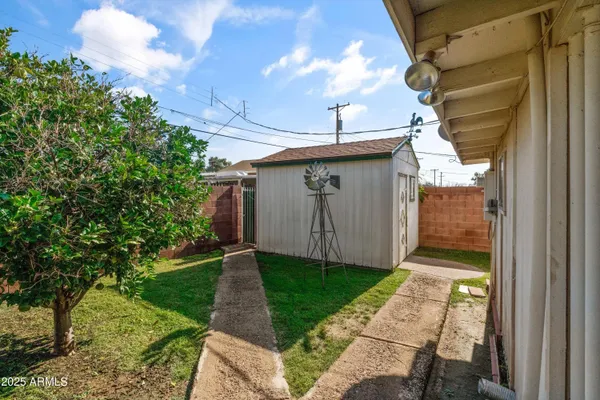 a view of a back yard of the house