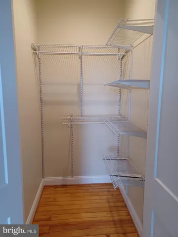 a view of an empty walk in closet