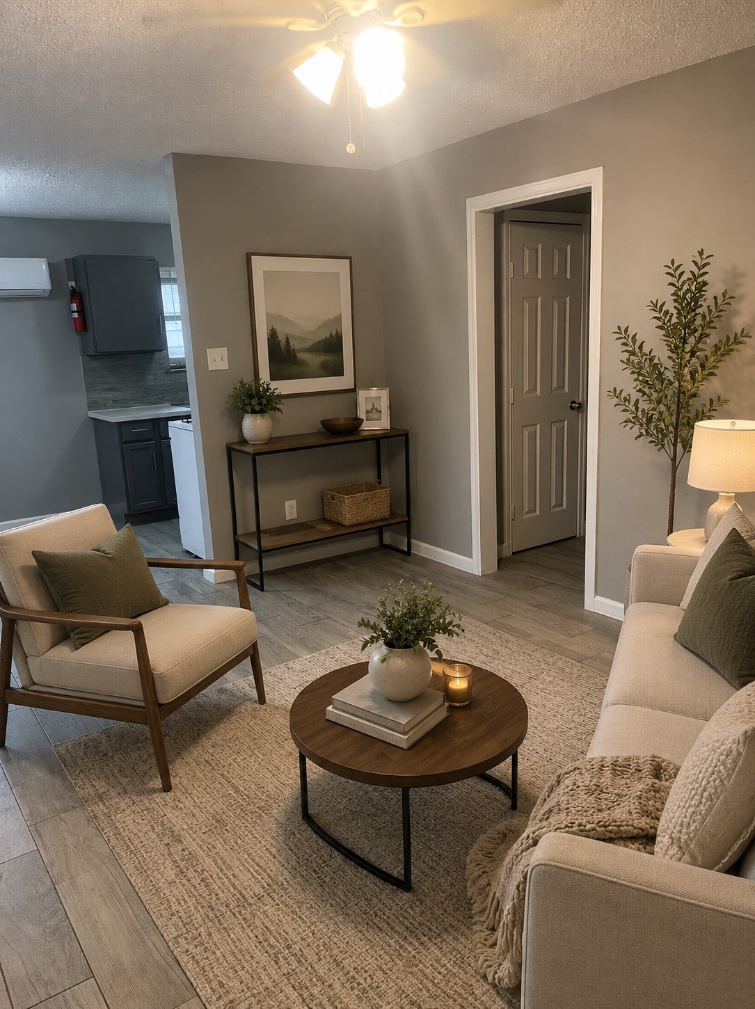 5418 Weaver Road, Unit A Houston, TX 77016 - Photo 10 of 11 a living room with furniture and a wooden floor