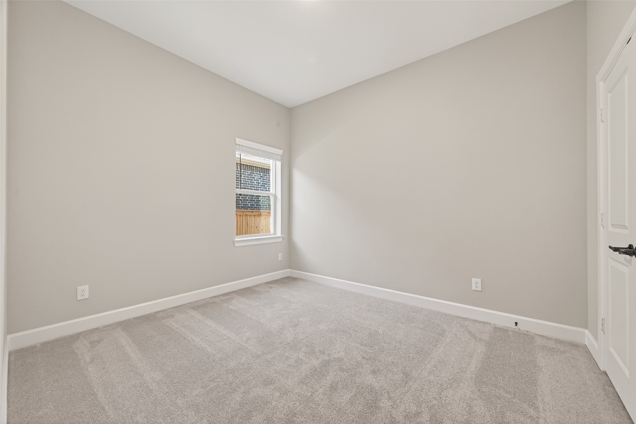 11219 Peacock Flower Street Cypress, TX 77433 - Photo 24 of 50 an empty room with a window