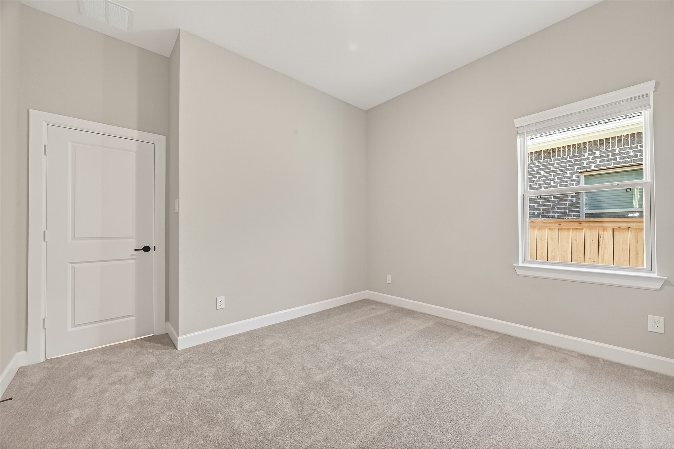 11219 Peacock Flower Street Cypress, TX 77433 - Photo 25 of 50 an empty room with a window