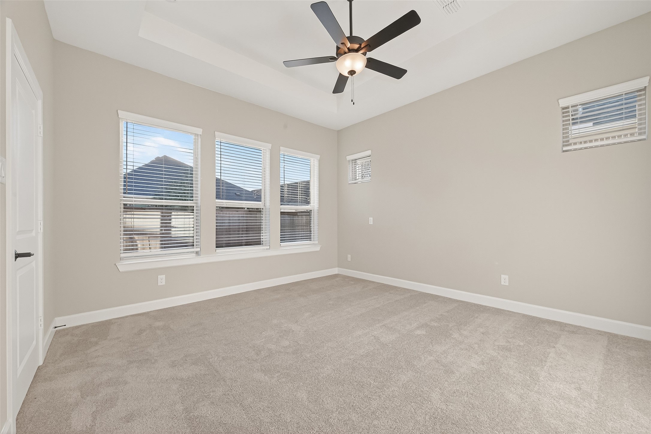 11219 Peacock Flower Street Cypress, TX 77433 - Photo 37 of 50 a view of an empty room with a window