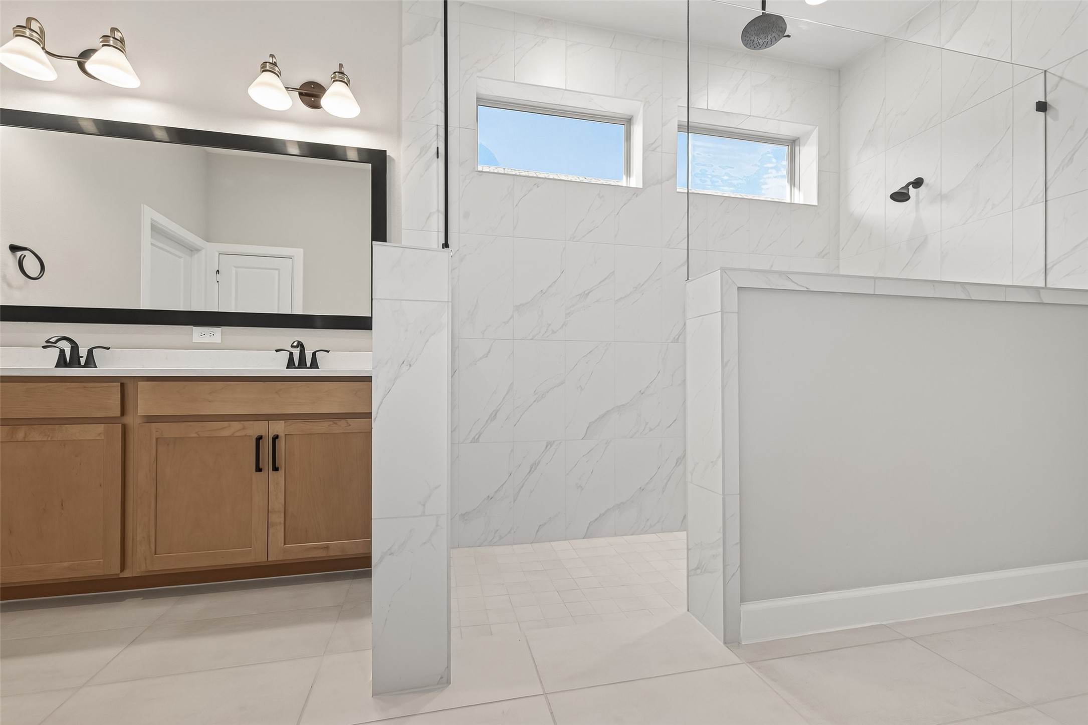 11219 Peacock Flower Street Cypress, TX 77433 - Photo 38 of 50 a view of a kitchen with white cabinets