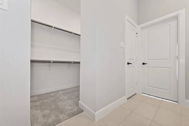 a view of a kitchen with a sink dryer and washer
