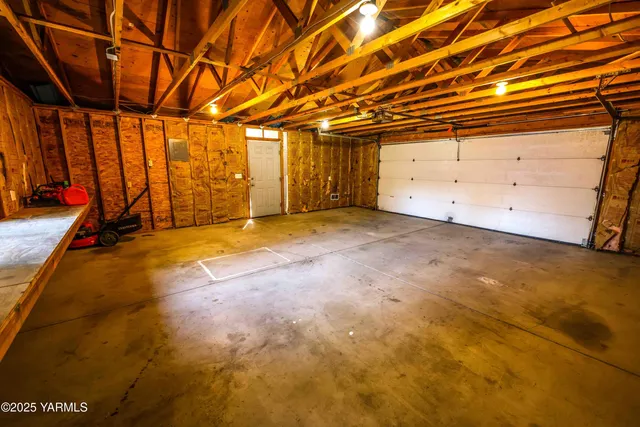 a view of a room with wooden walls