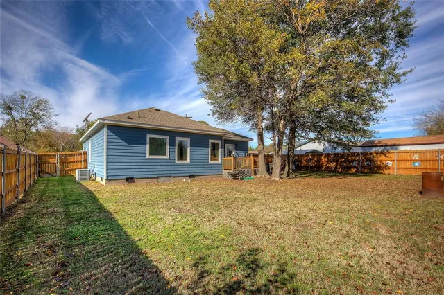 a view of a balcony with wooden floor