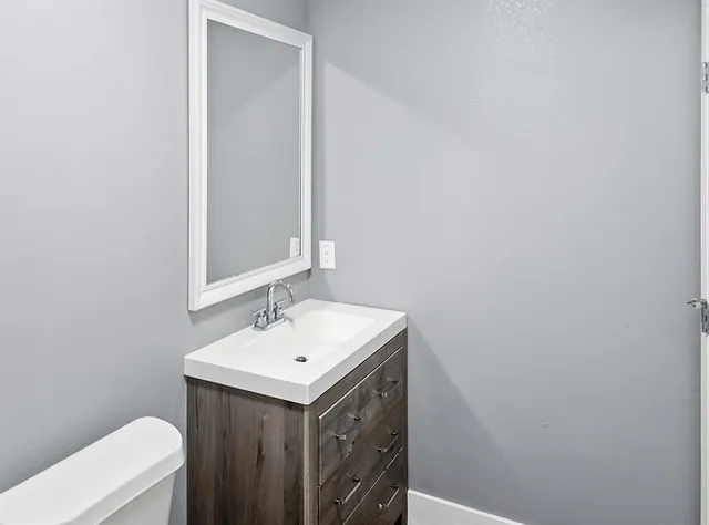 a bathroom with a toilet and a bathtub