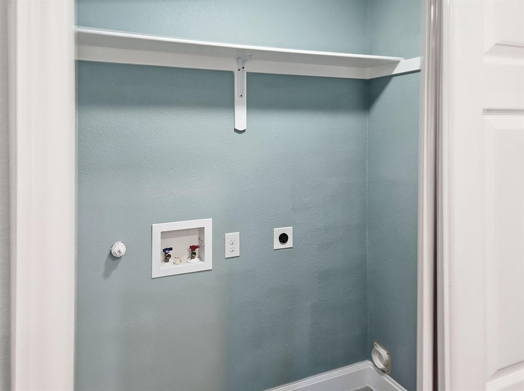 110 Ramsey Street Cleburne, TX 76031 - Photo 20 of 27 a bathroom with a shower and a toilet