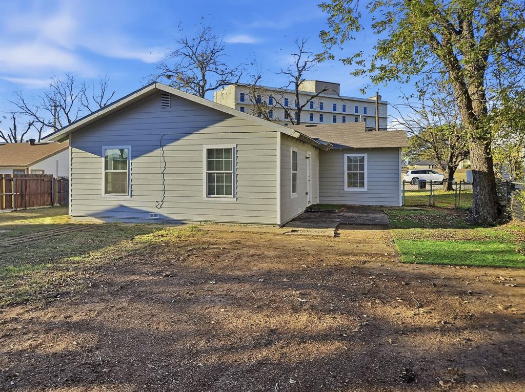 110 Ramsey Street Cleburne, TX 76031 - Photo 26 of 27 a view of a house with a yard