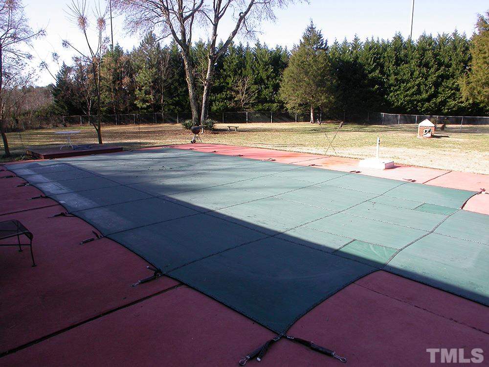 6301 Johnsdale Road Raleigh, NC 27615 - Photo 22 of 25 a view of a tennis court