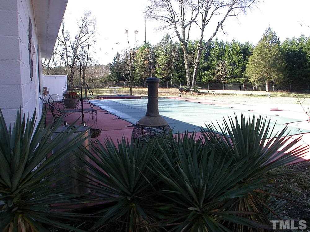 6301 Johnsdale Road Raleigh, NC 27615 - Photo 23 of 25 a view of street with palm trees