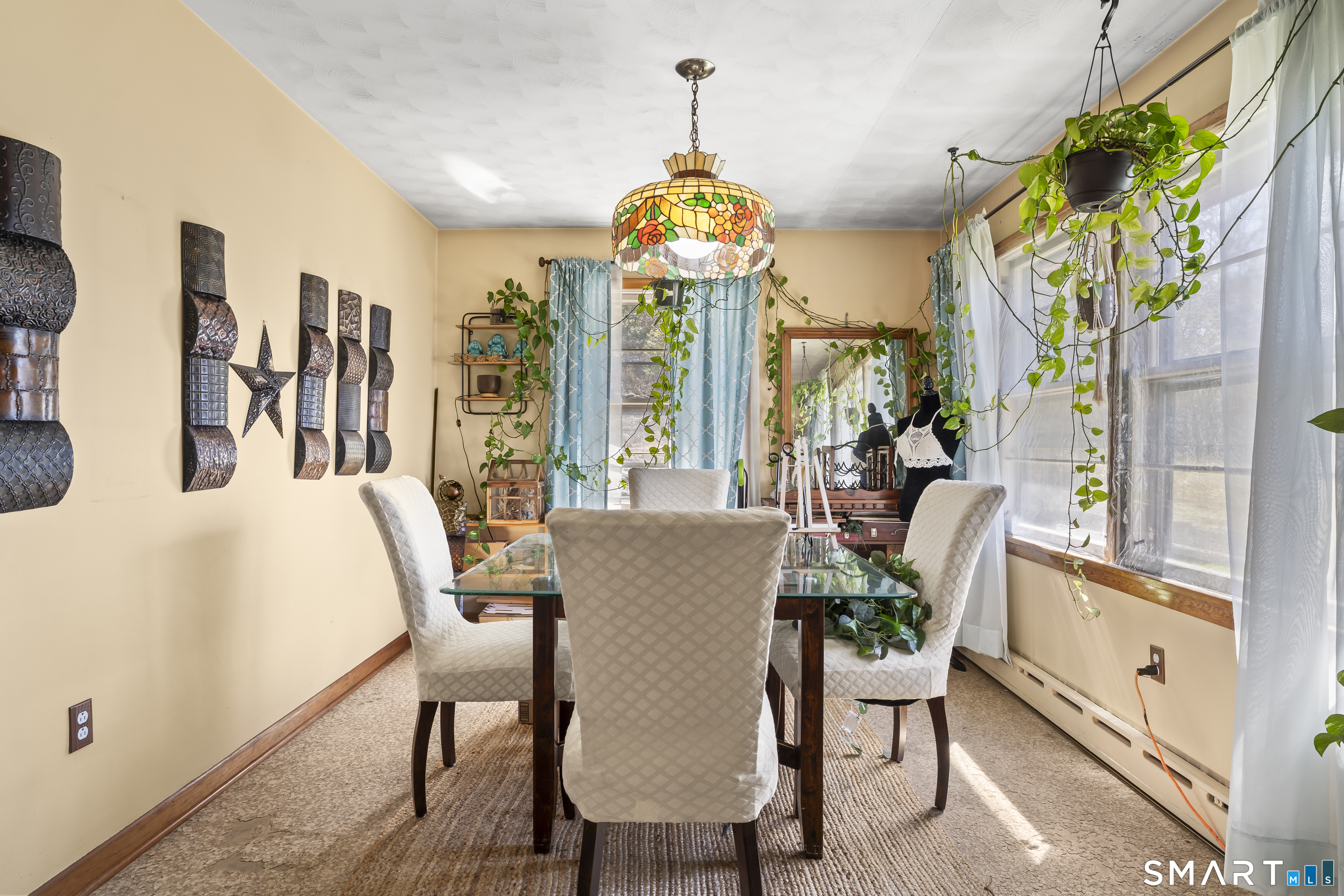 76 Lucas Park Road Norwich, CT 06360 - Photo 11 of 39 a view of a dining room with furniture window and outside view