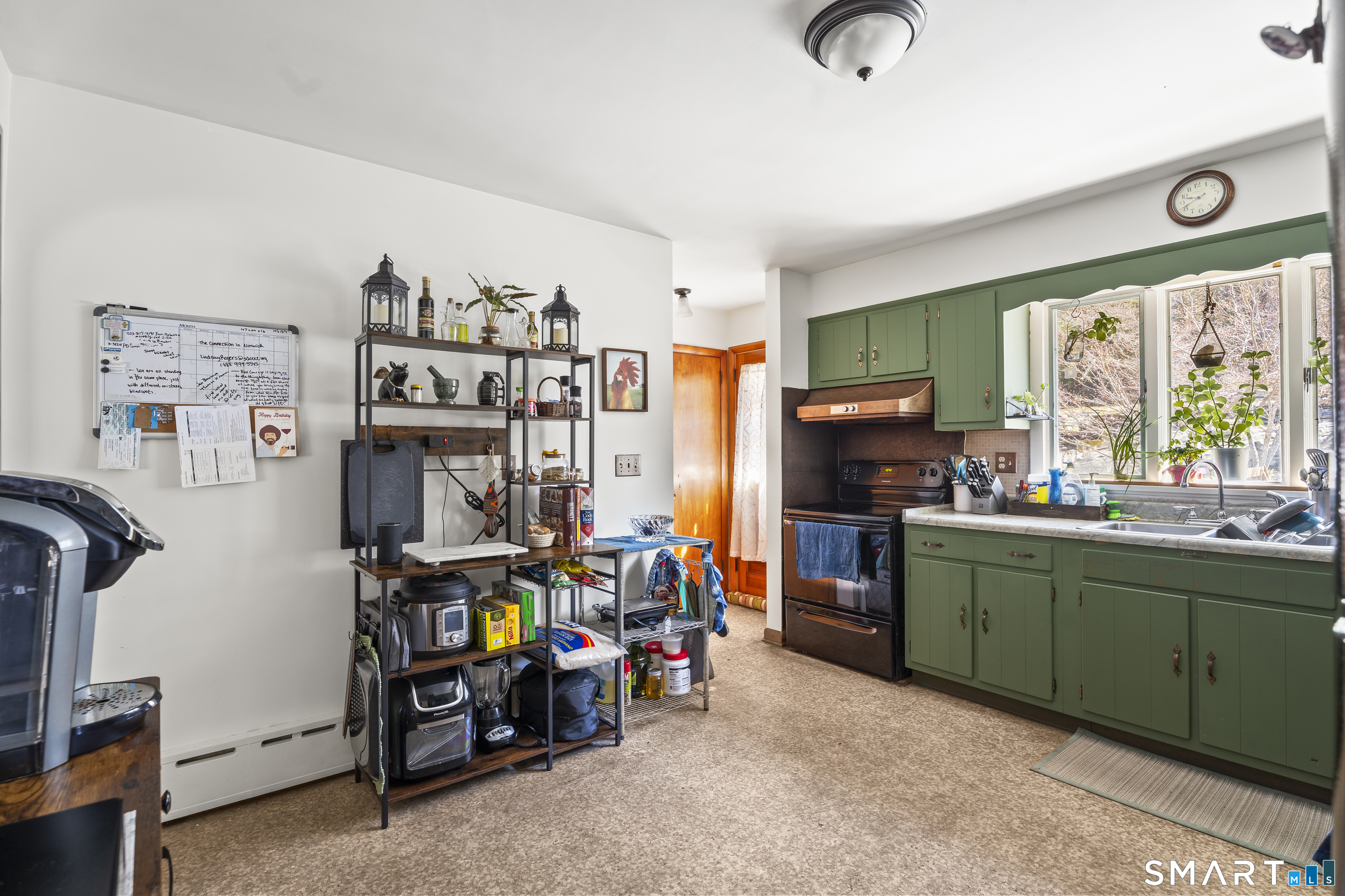 76 Lucas Park Road Norwich, CT 06360 - Photo 15 of 39 a living room with furniture and a window