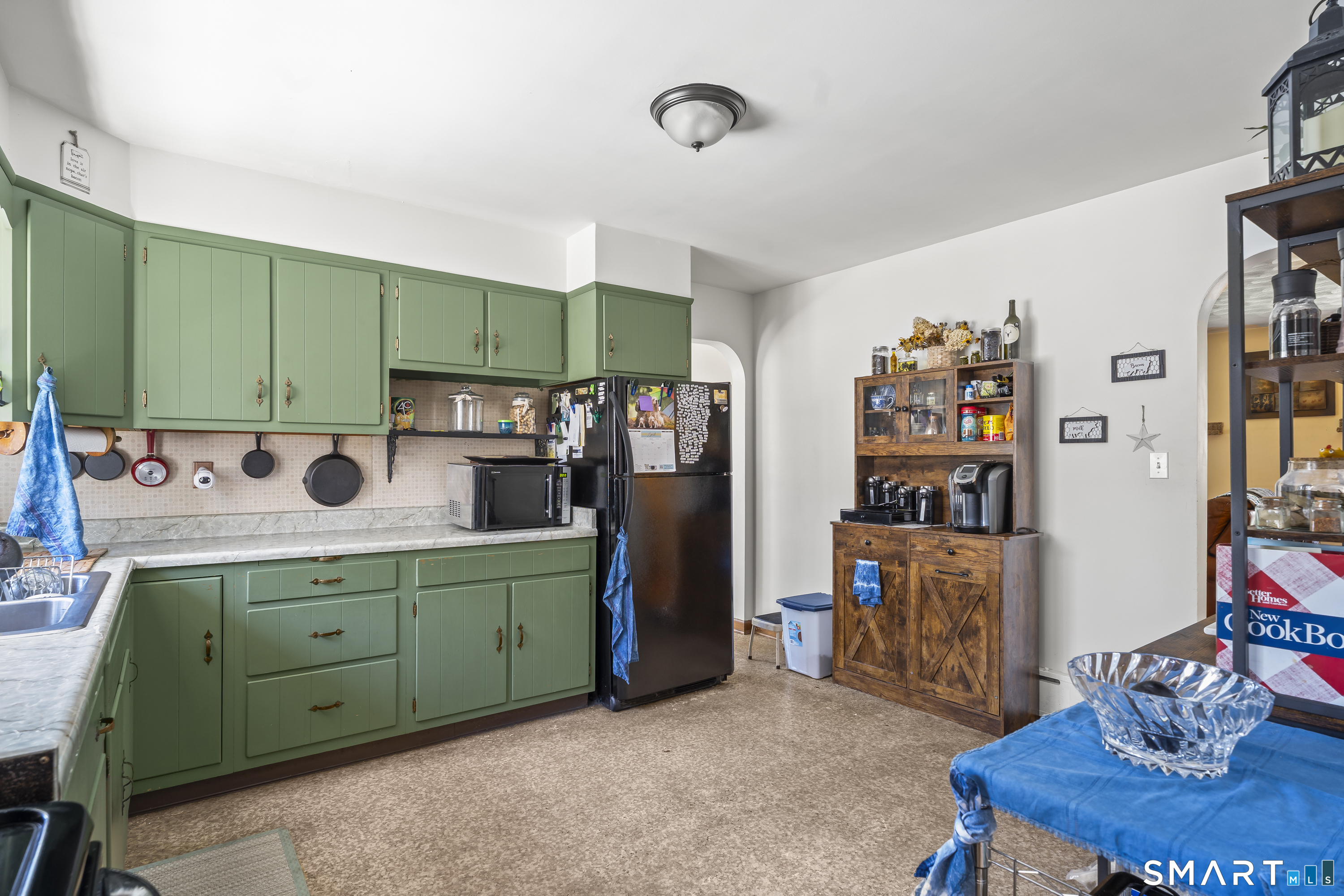 76 Lucas Park Road Norwich, CT 06360 - Photo 18 of 39 a utility room with lots of wooden furniture