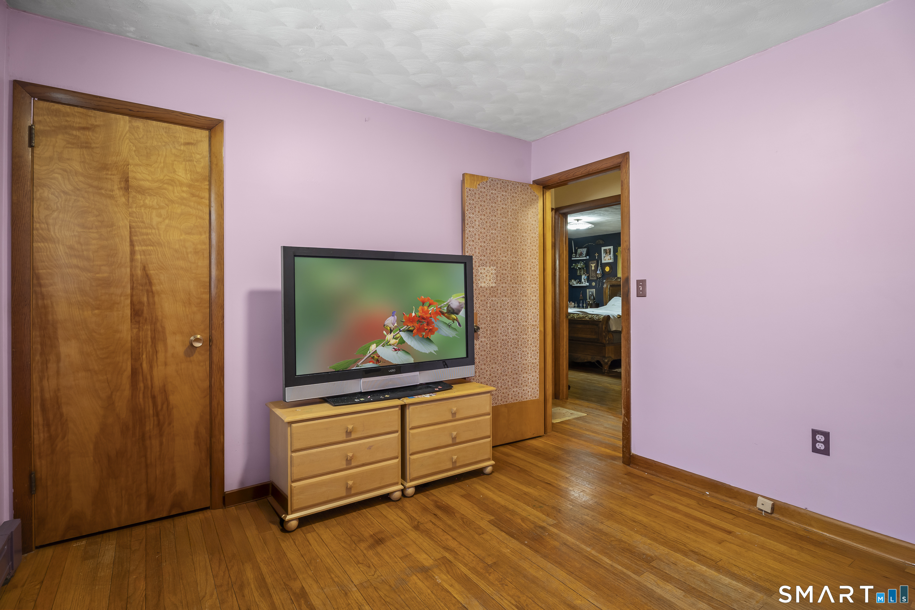 76 Lucas Park Road Norwich, CT 06360 - Photo 19 of 39 a living room with furniture and a flat screen tv
